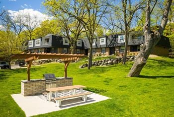 Grilling area with a picnic table